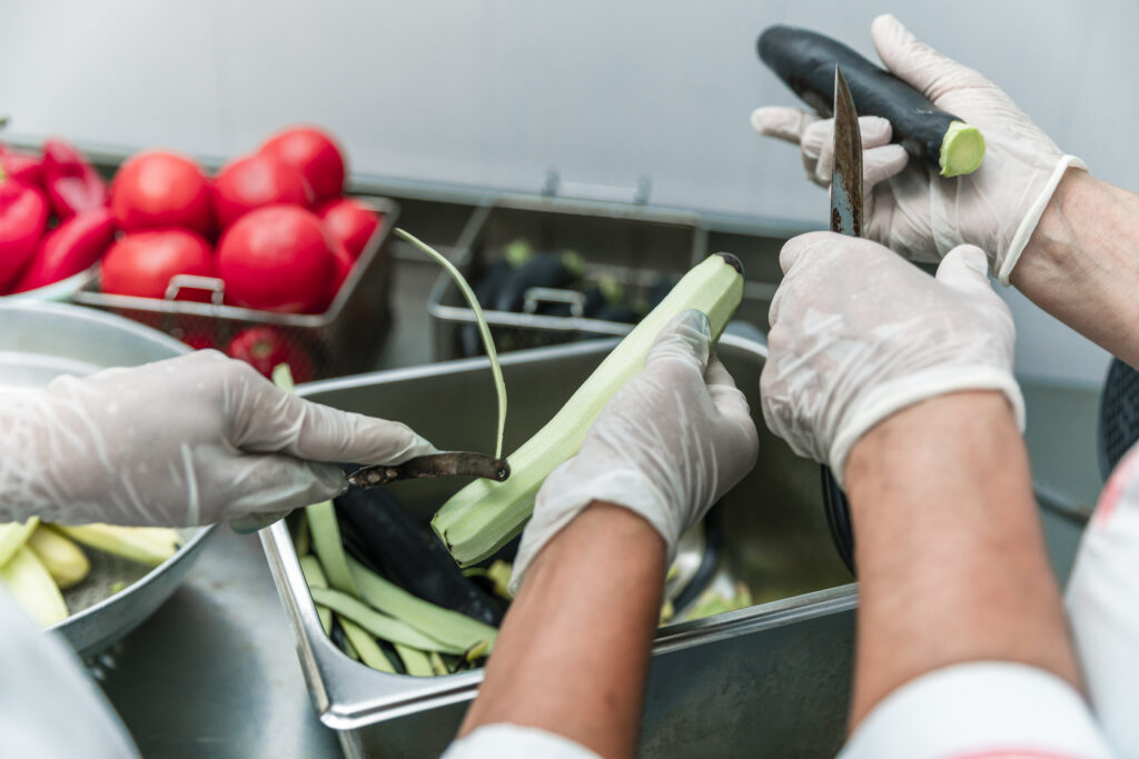 Peeling or cutting vegetables in the kitchen